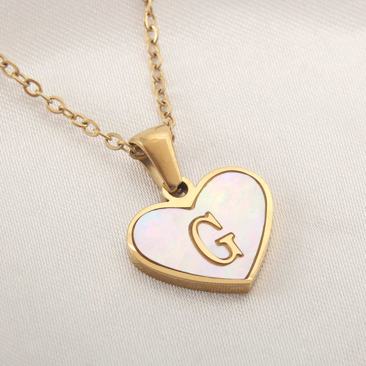 Heart-shaped letter Necklaces.