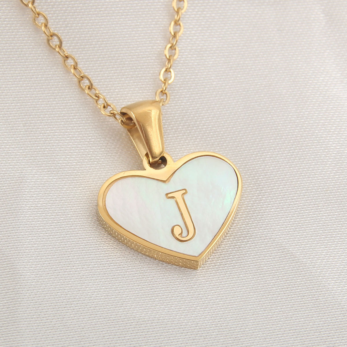 Heart-shaped letter Necklaces.