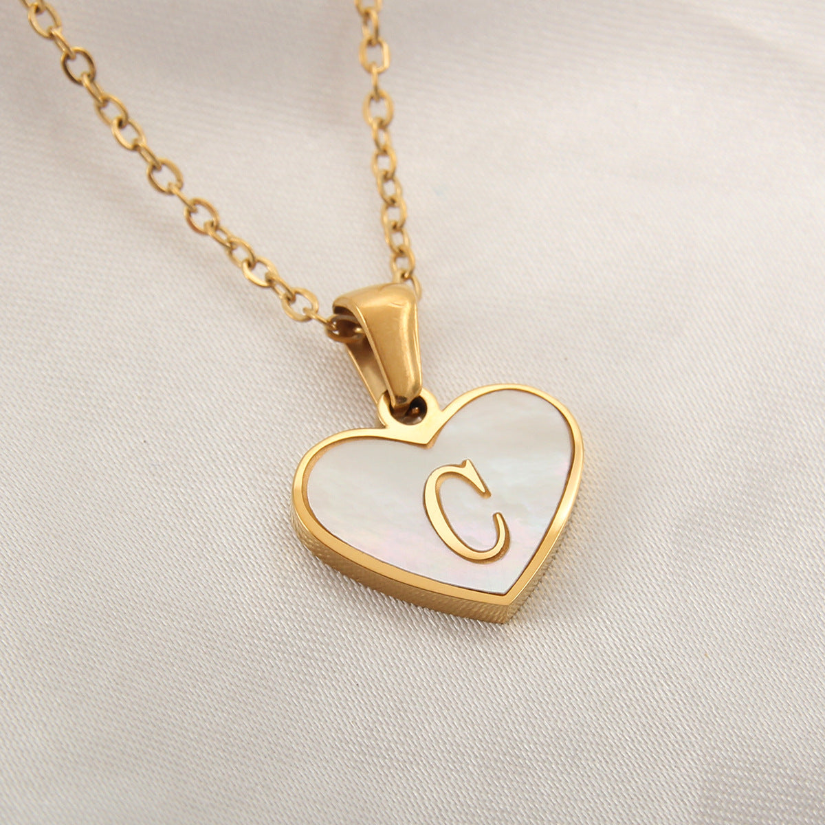 Heart-shaped letter Necklaces.