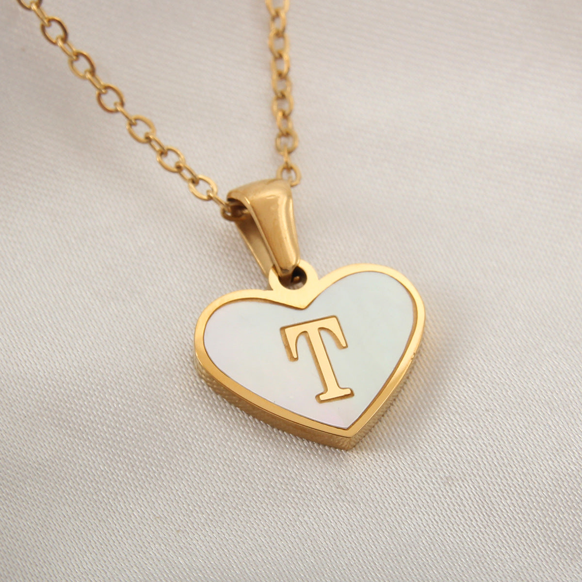 Heart-shaped letter Necklaces.