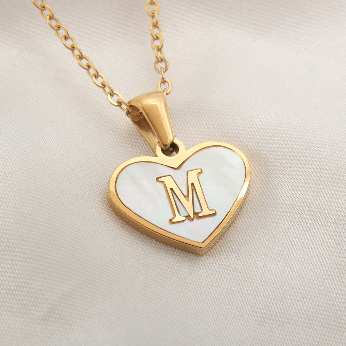 Heart-shaped letter Necklaces.