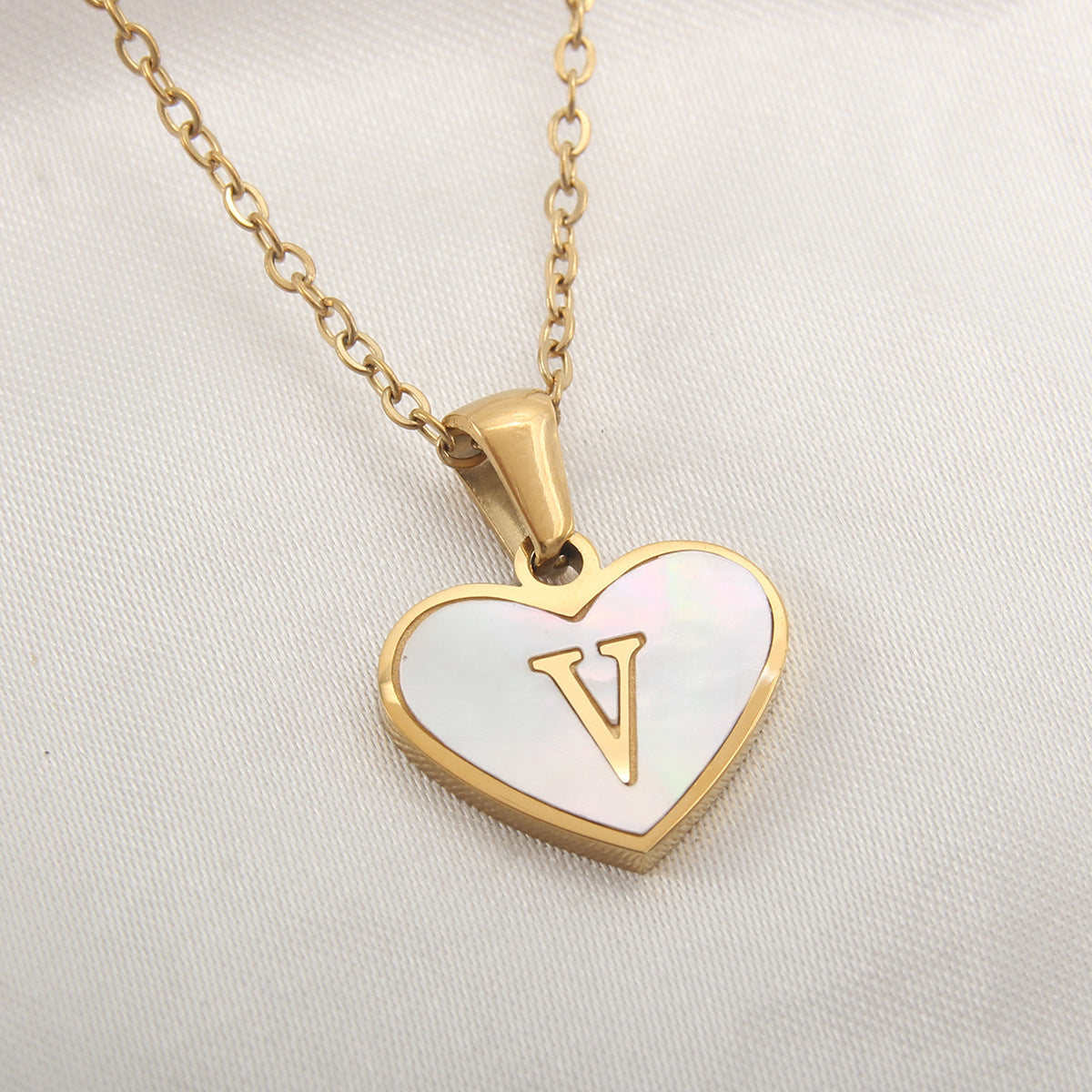 Heart-shaped letter Necklaces.