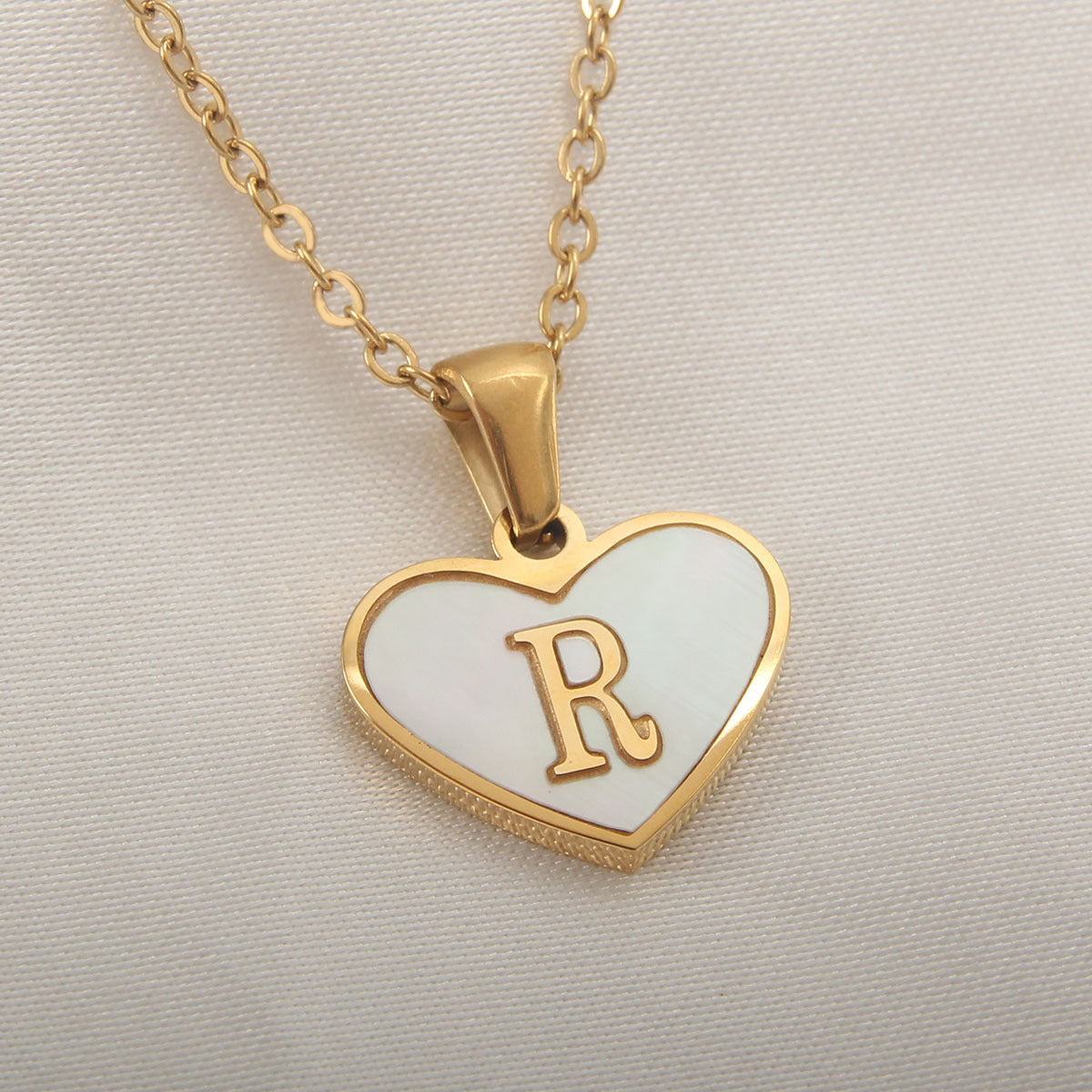 Heart-shaped letter Necklaces.