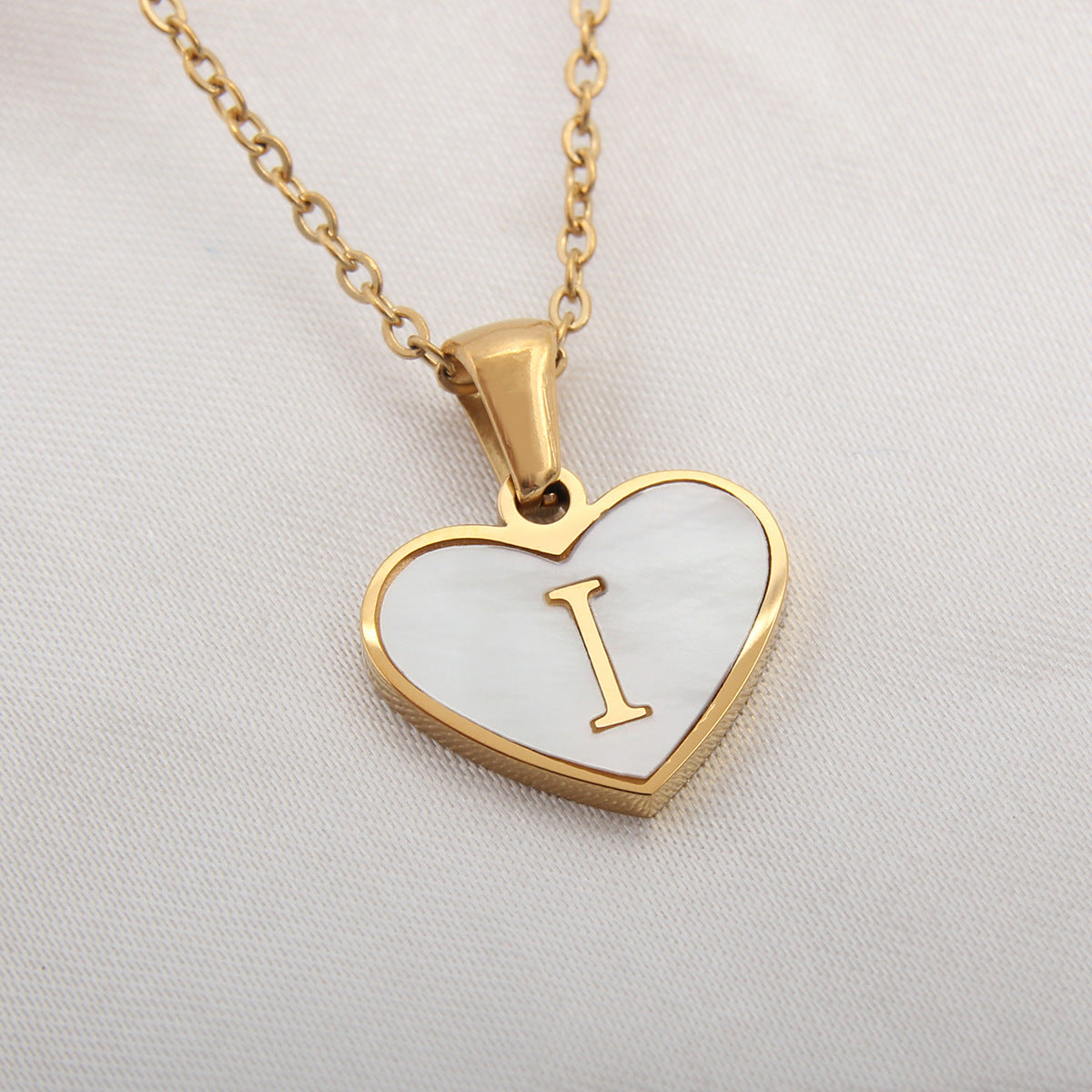 Heart-shaped letter Necklaces.