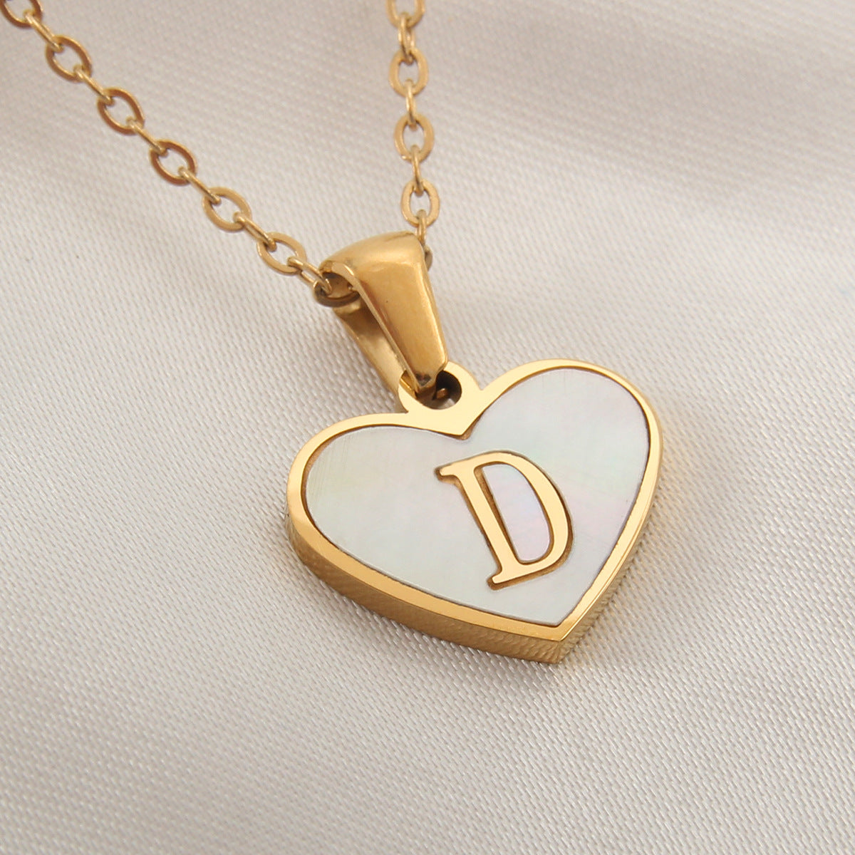 Heart-shaped letter Necklaces.