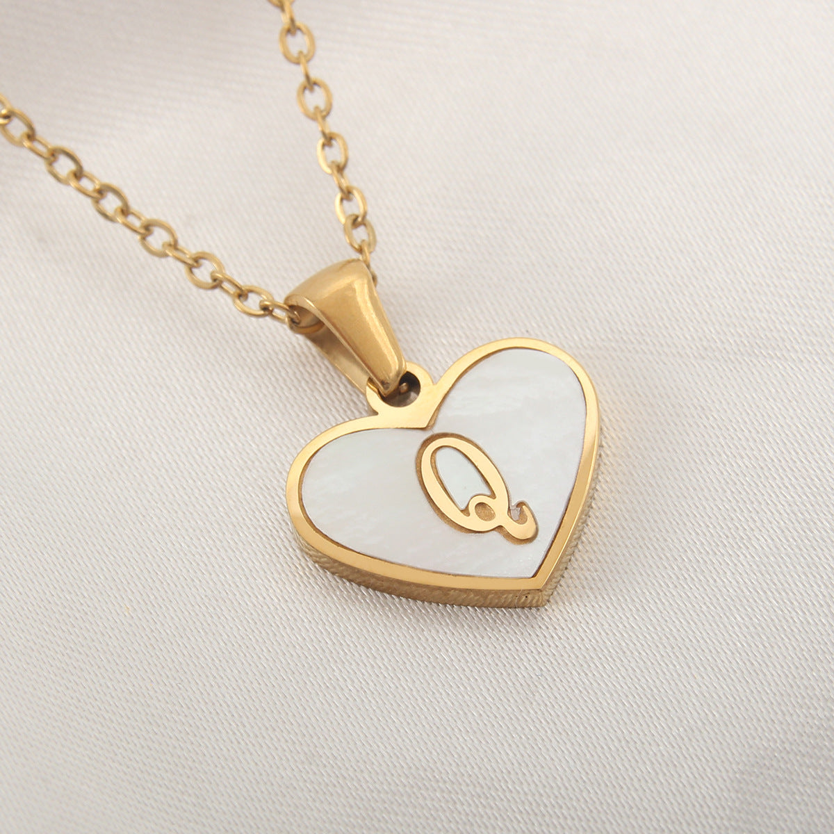 Heart-shaped letter Necklaces.