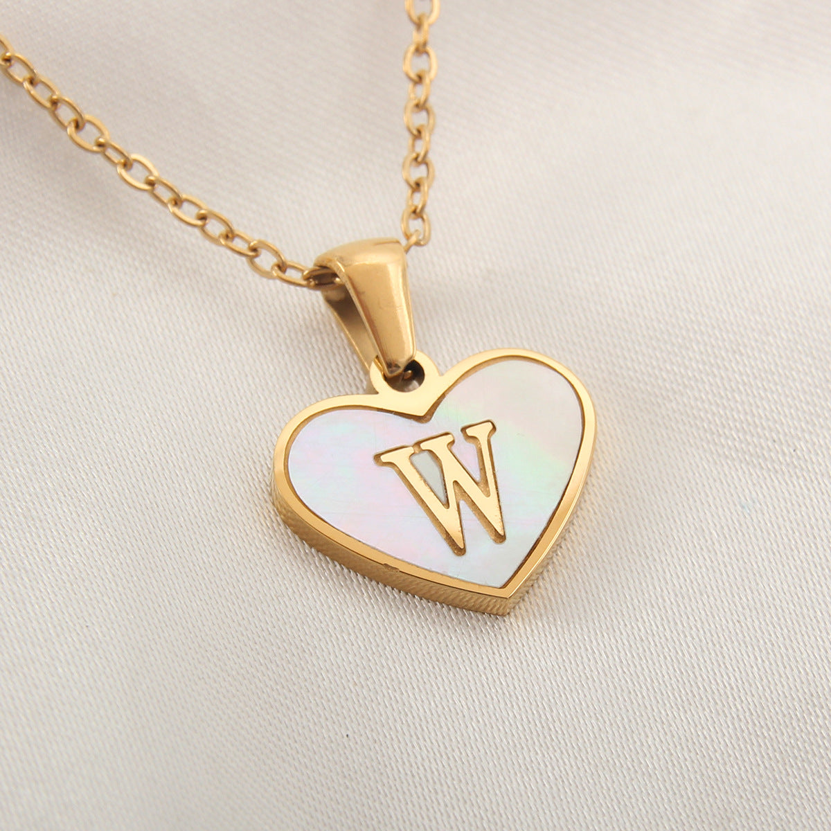 Heart-shaped letter Necklaces.