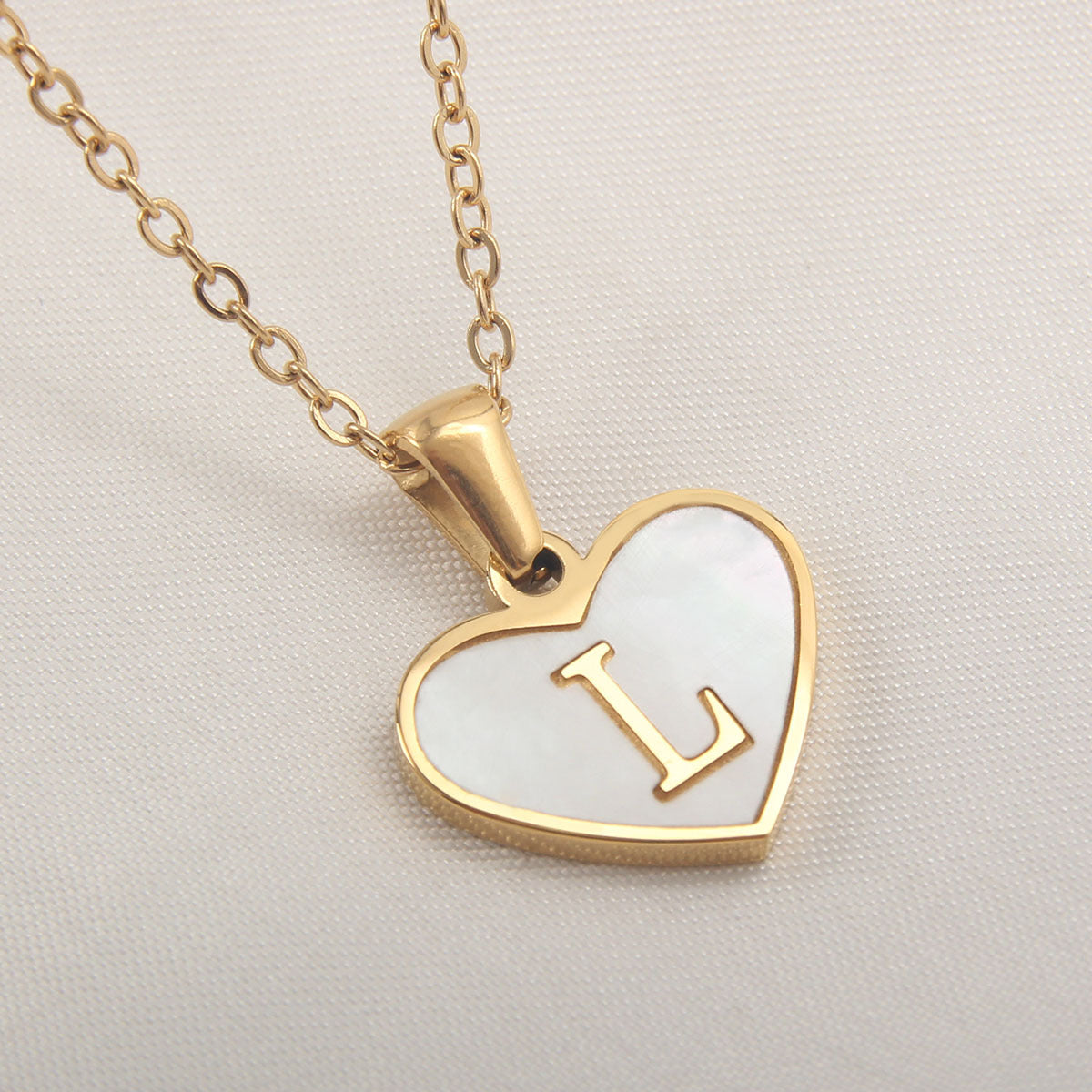 Heart-shaped letter Necklaces.