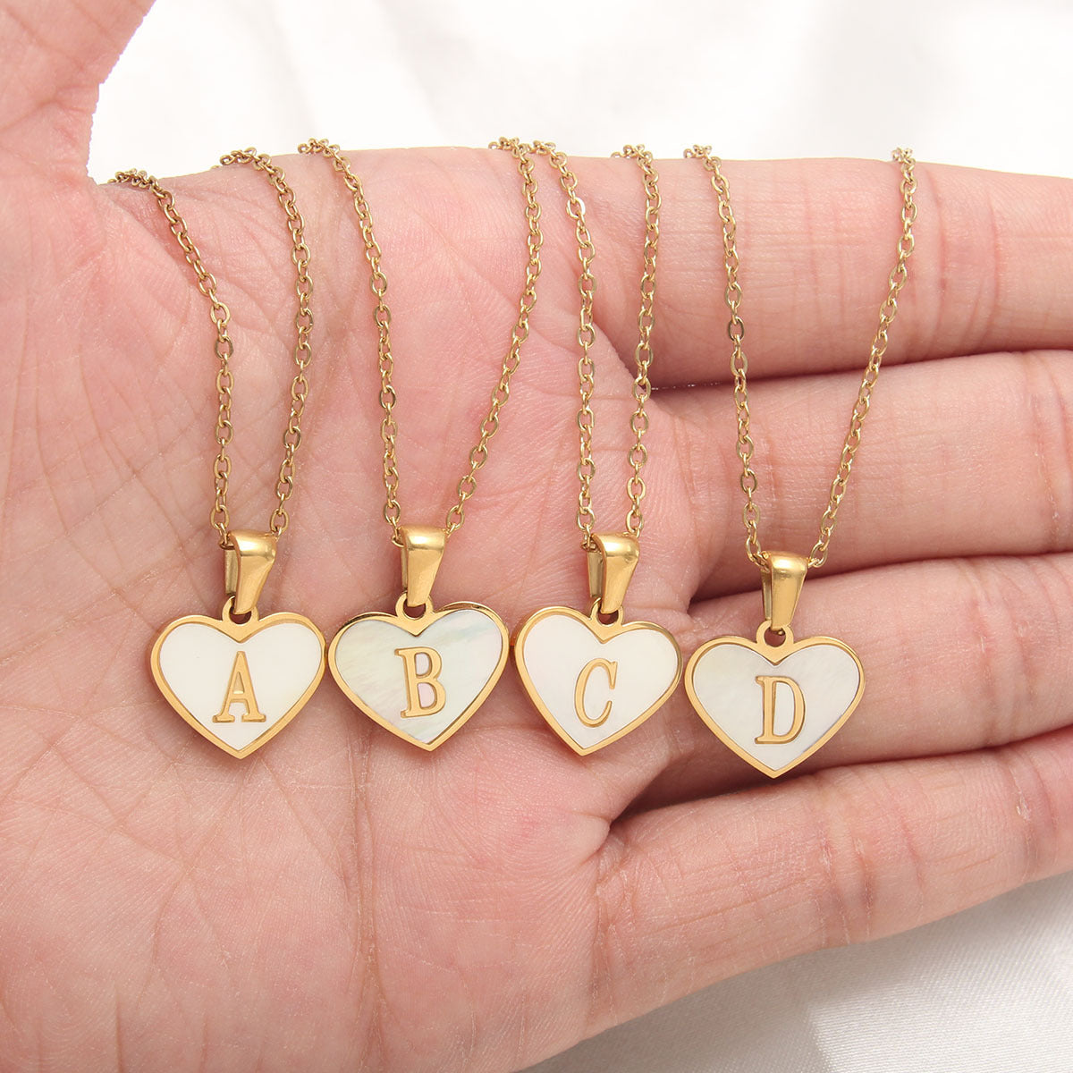 Heart-shaped letter Necklaces.