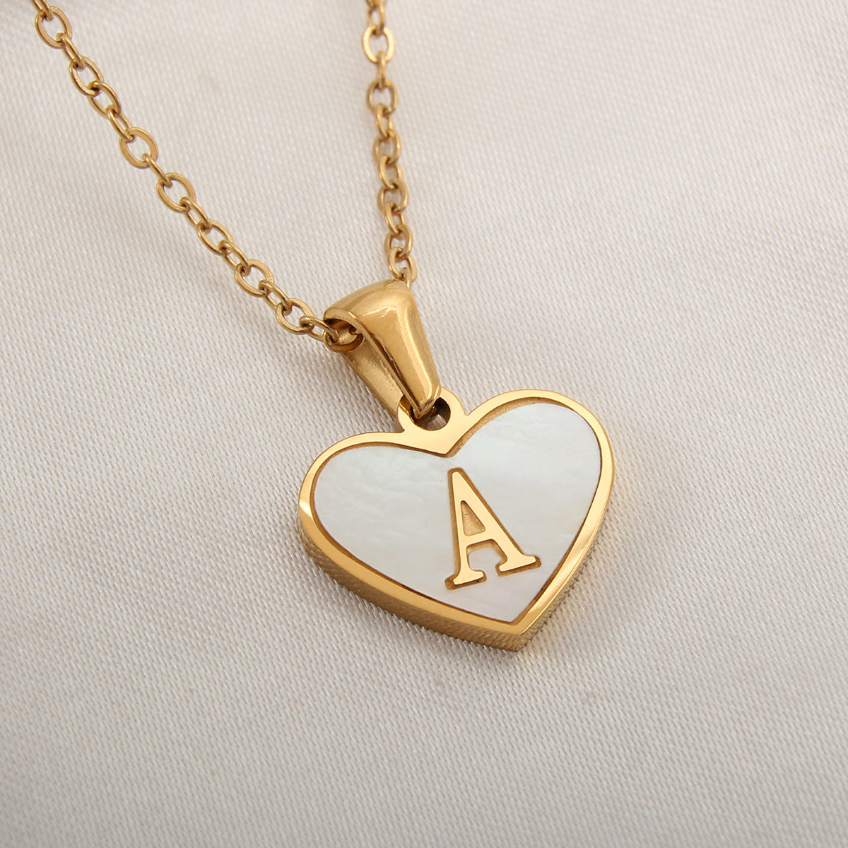 Heart-shaped letter Necklaces.