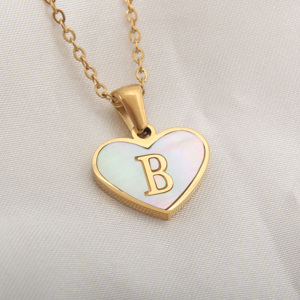 Heart-shaped letter Necklaces.