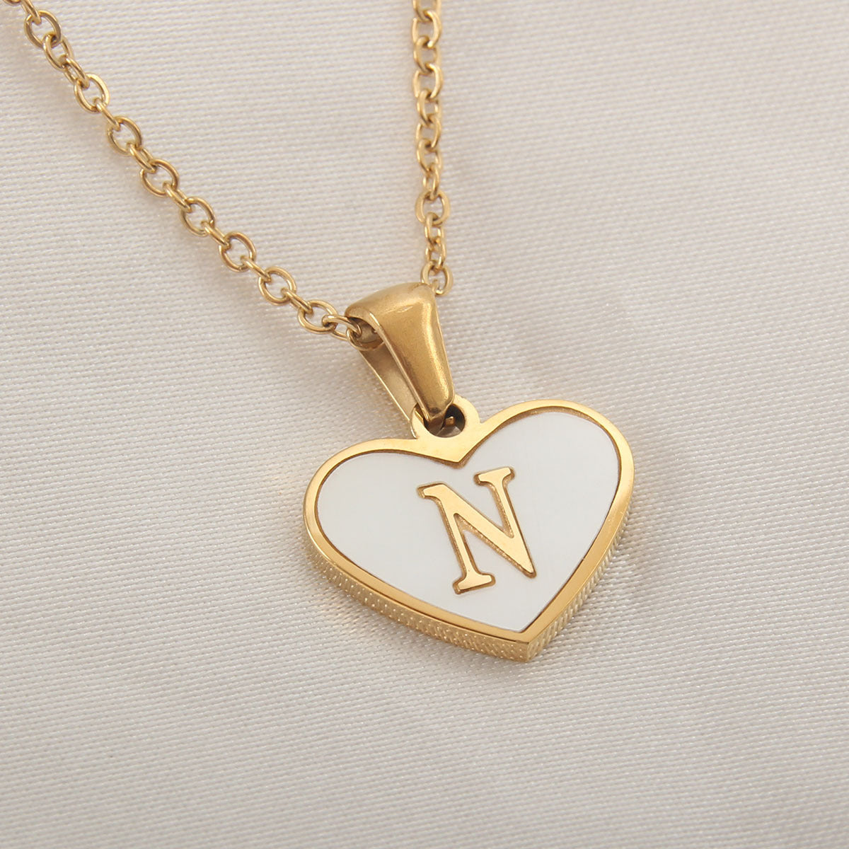 Heart-shaped letter Necklaces.