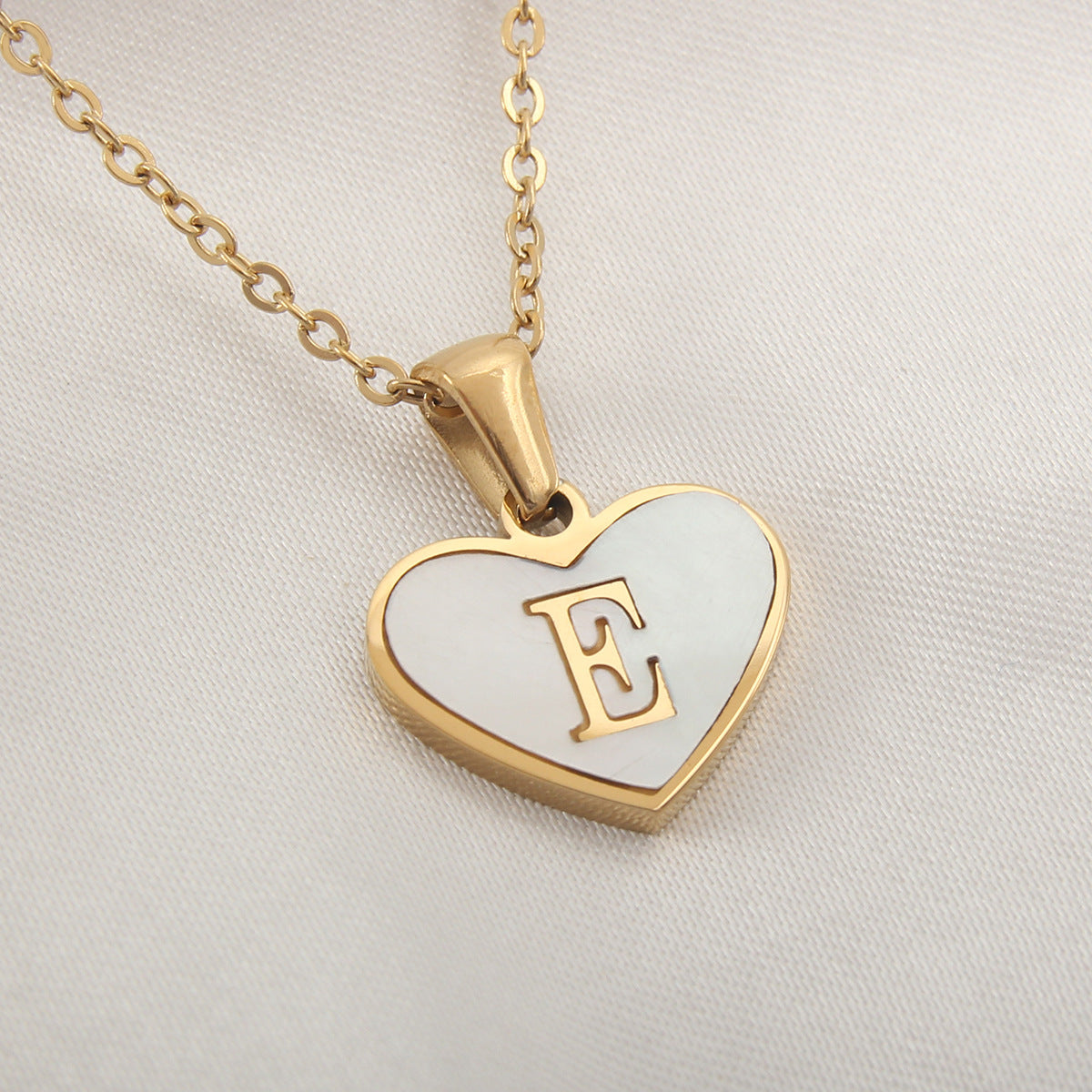 Heart-shaped letter Necklaces.