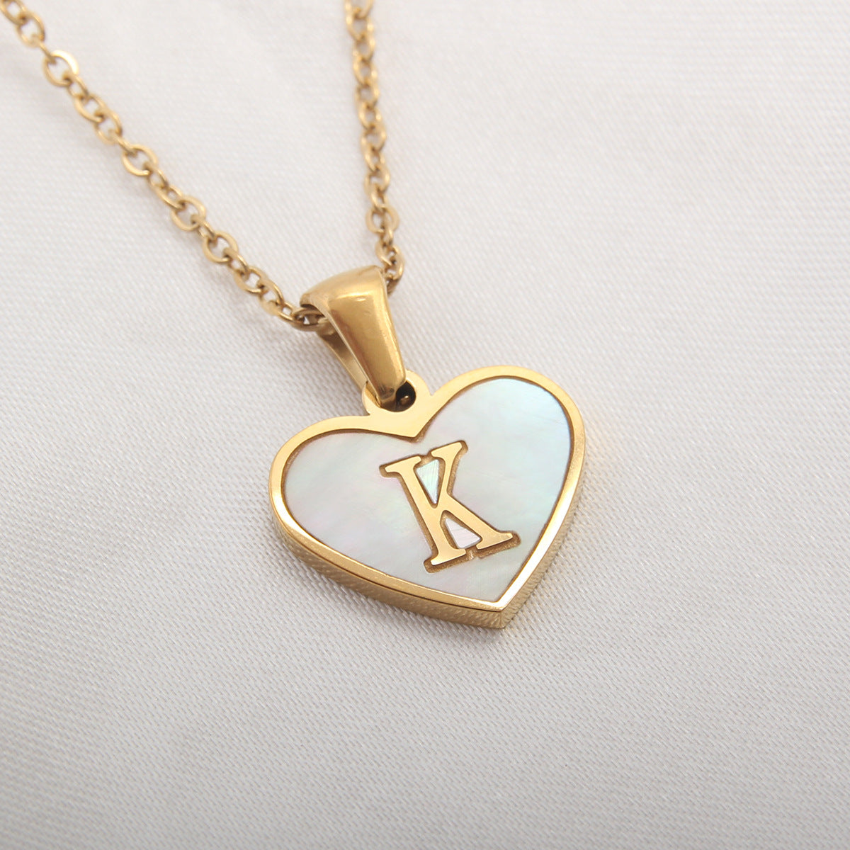 Heart-shaped letter Necklaces.