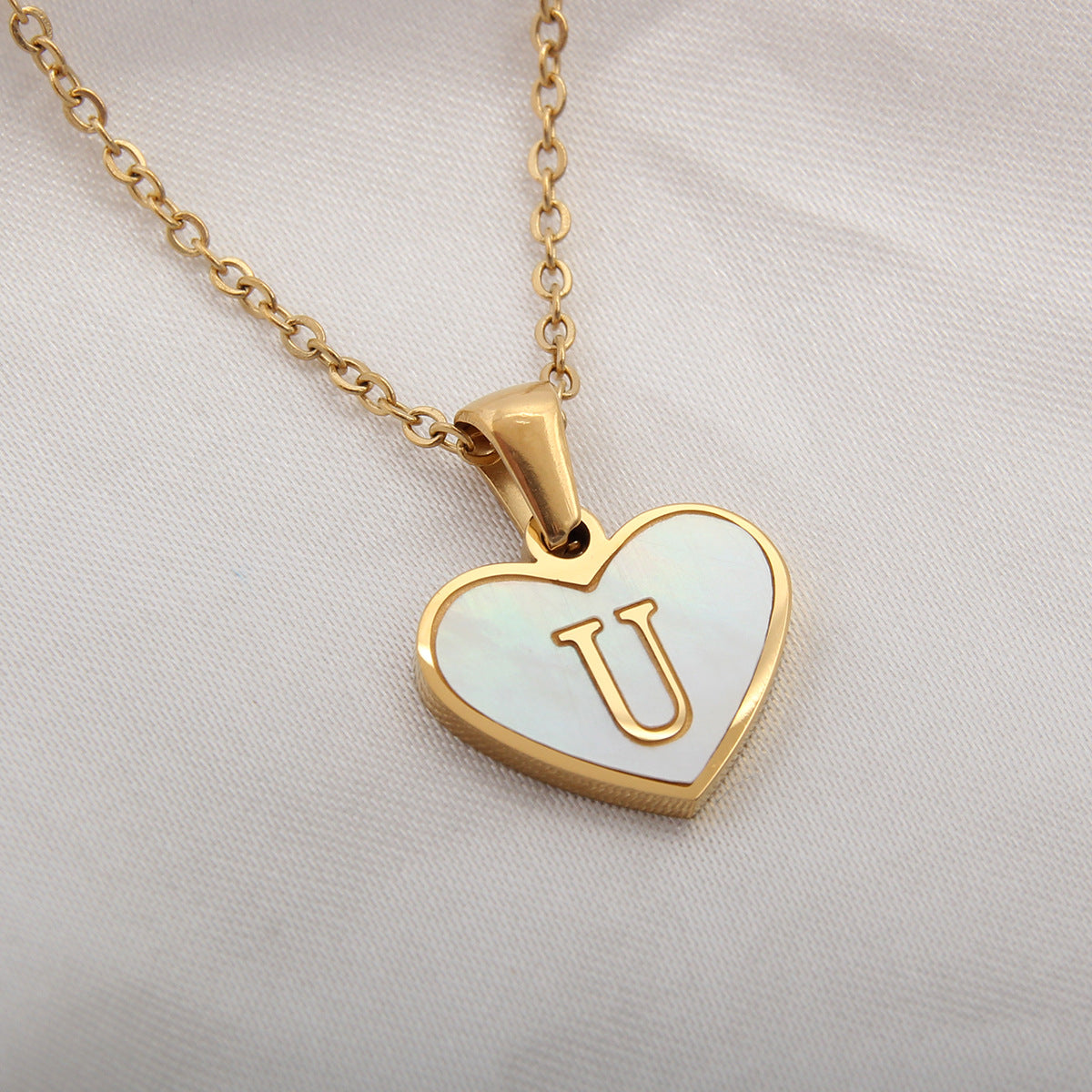 Heart-shaped letter Necklaces.