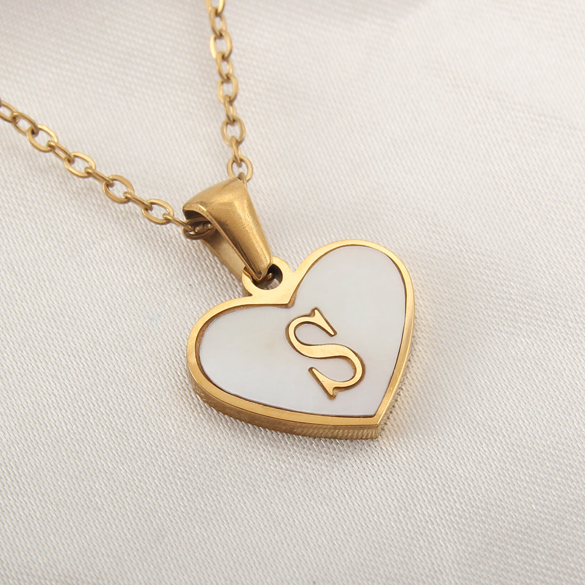 Heart-shaped letter Necklaces.