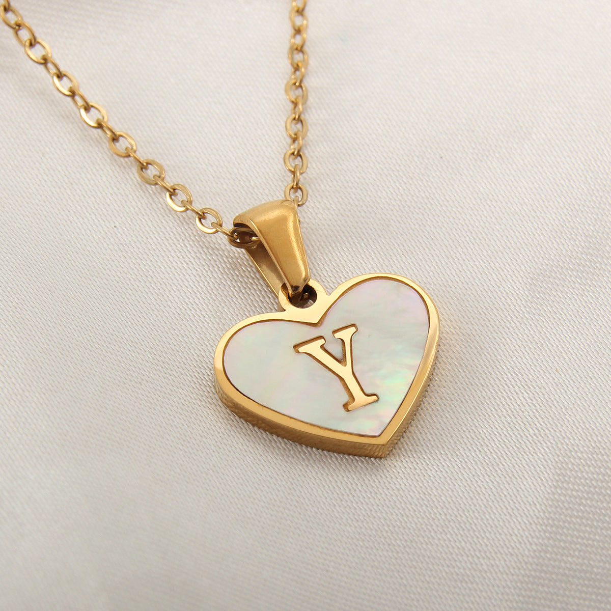 Heart-shaped letter Necklaces.